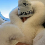 Veste en fausse fourrure surdimensionnée avec capuche extra-large