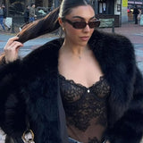 Manteau en fausse fourrure classique avec col large